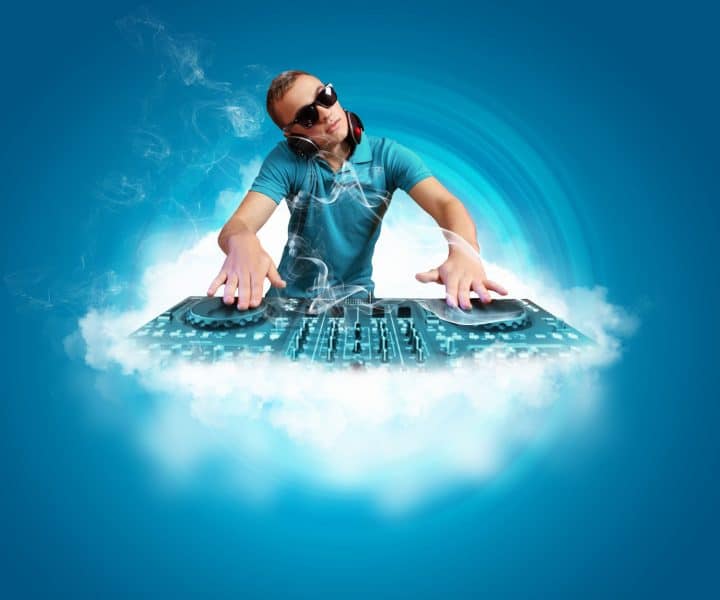 17578814 - dj with a mixer equipment to control sound and play music